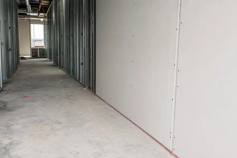 Type X drywall installed on metal studs forming a fire rated partition in Noblesville, IN