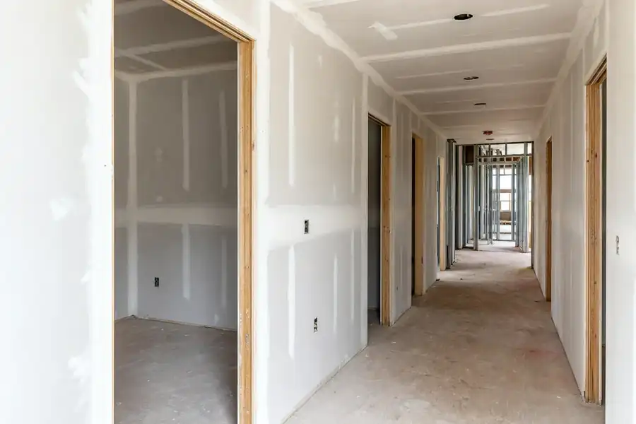 Multi-unit residential building under construction in Noblesville, IN with framed apartment interiors