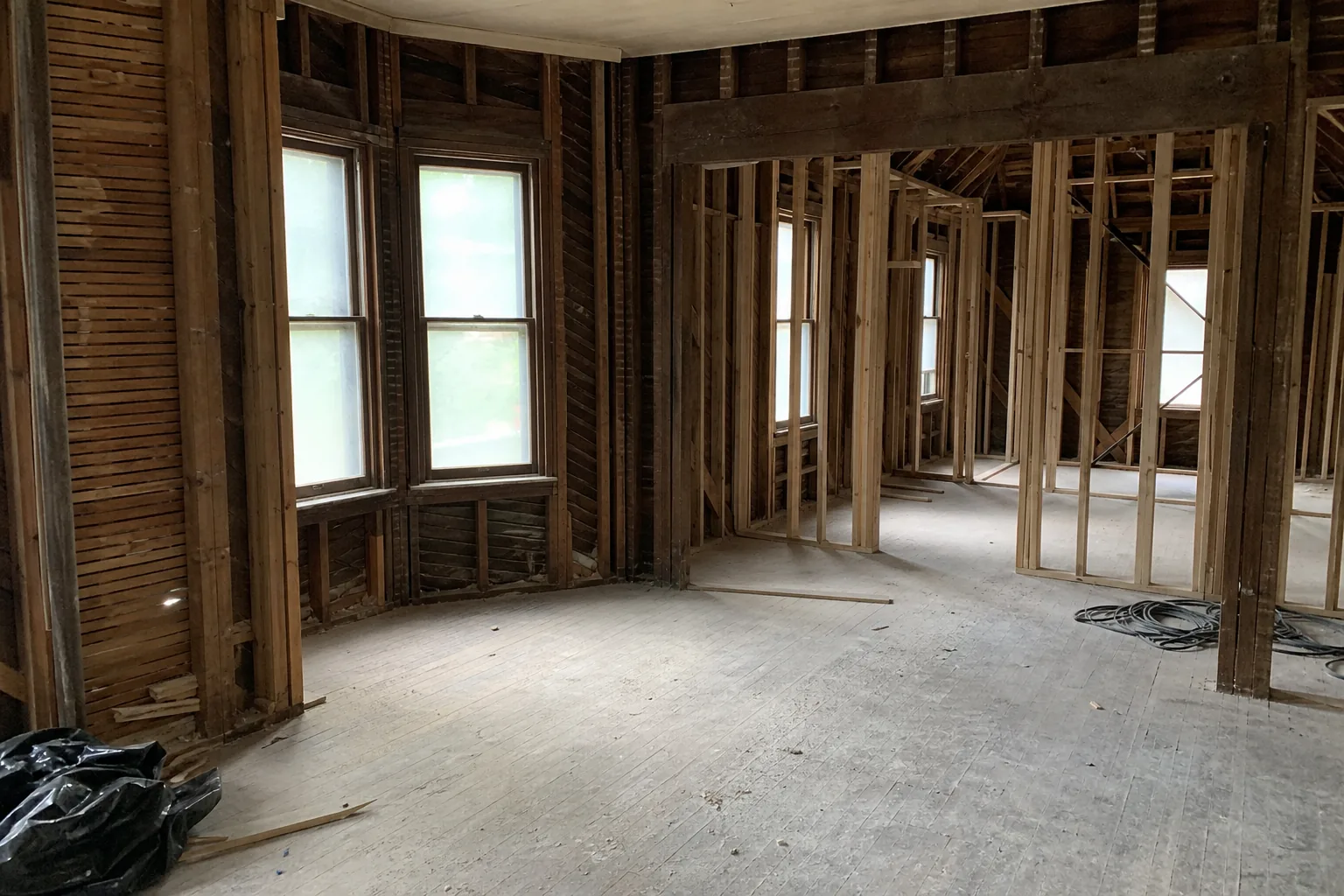 Older Noblesville, IN house opened to the studs with original lath during renovation