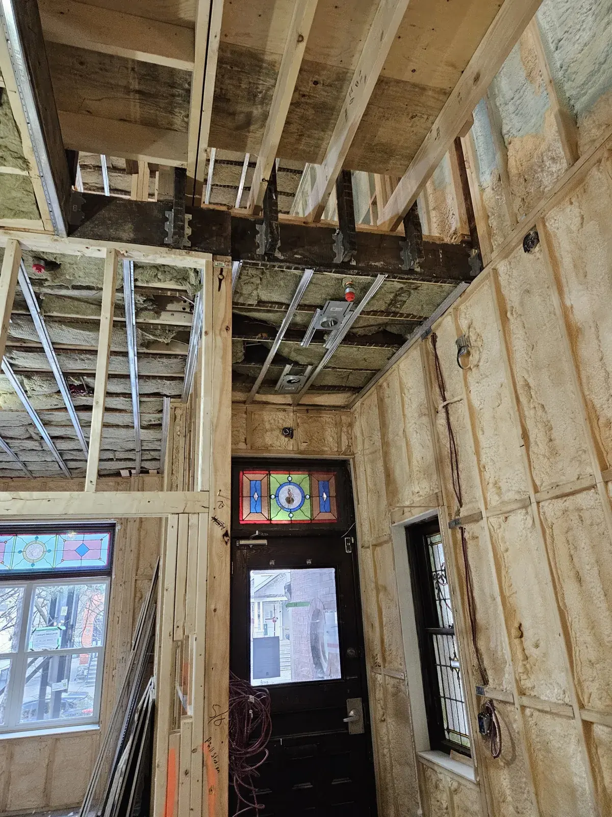 Older north Indianapolis home gutted to the studs with framing and insulation work underway